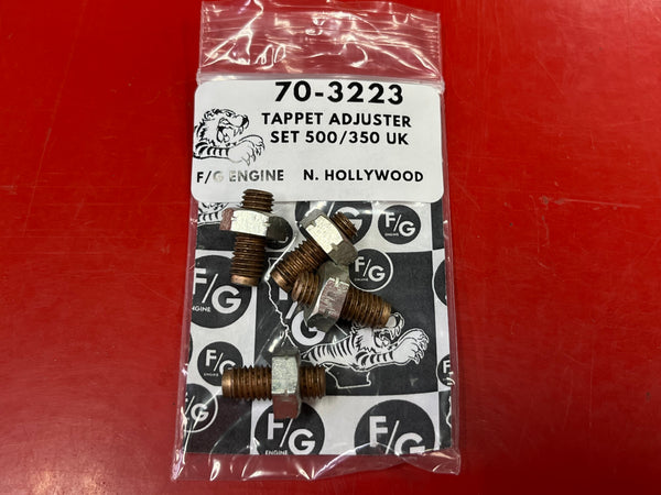 Packaged Triumph 500 tappet adjuster set with F&G branding on a red background