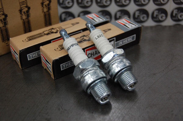 Photo of a pair of Champion L82C spark plugs used in vintage Triumph motorcycles