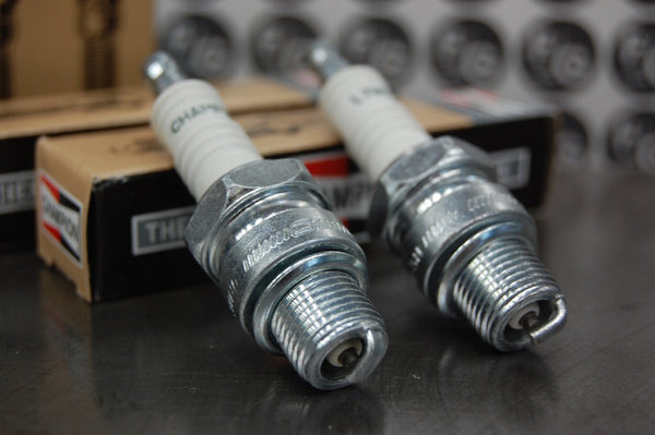 Photo of a pair of Champion L78C spark plugs used in vintage pre unit Triumph motorcycles